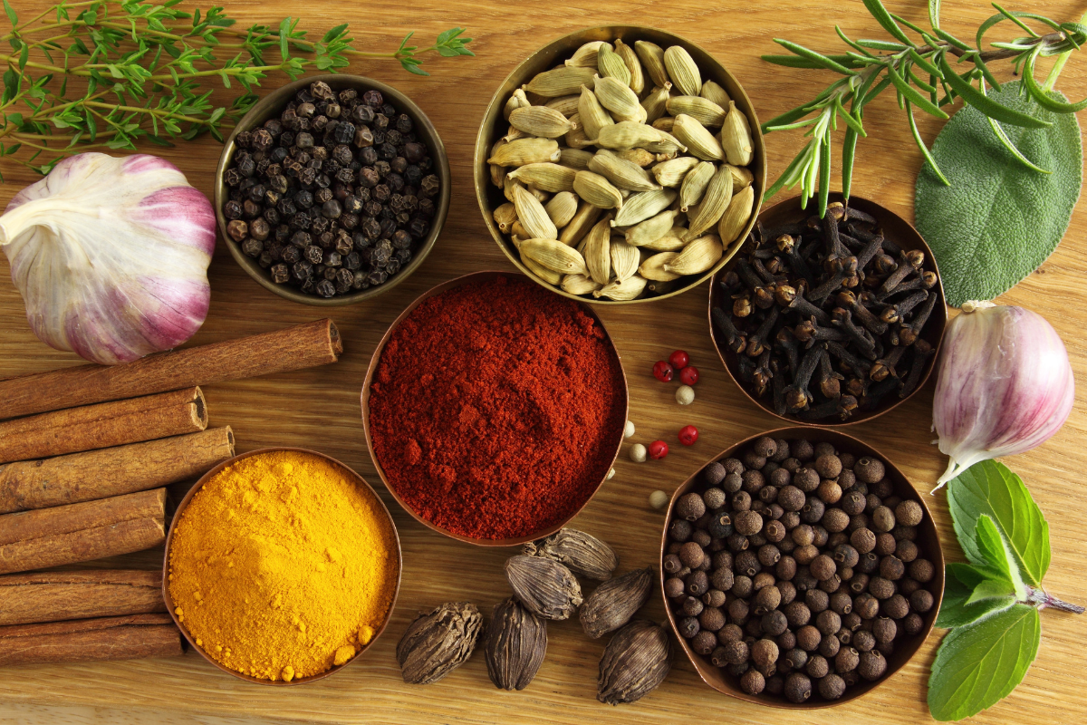 Spices and herbs in metal bowls. Food and cuisine ingredients.