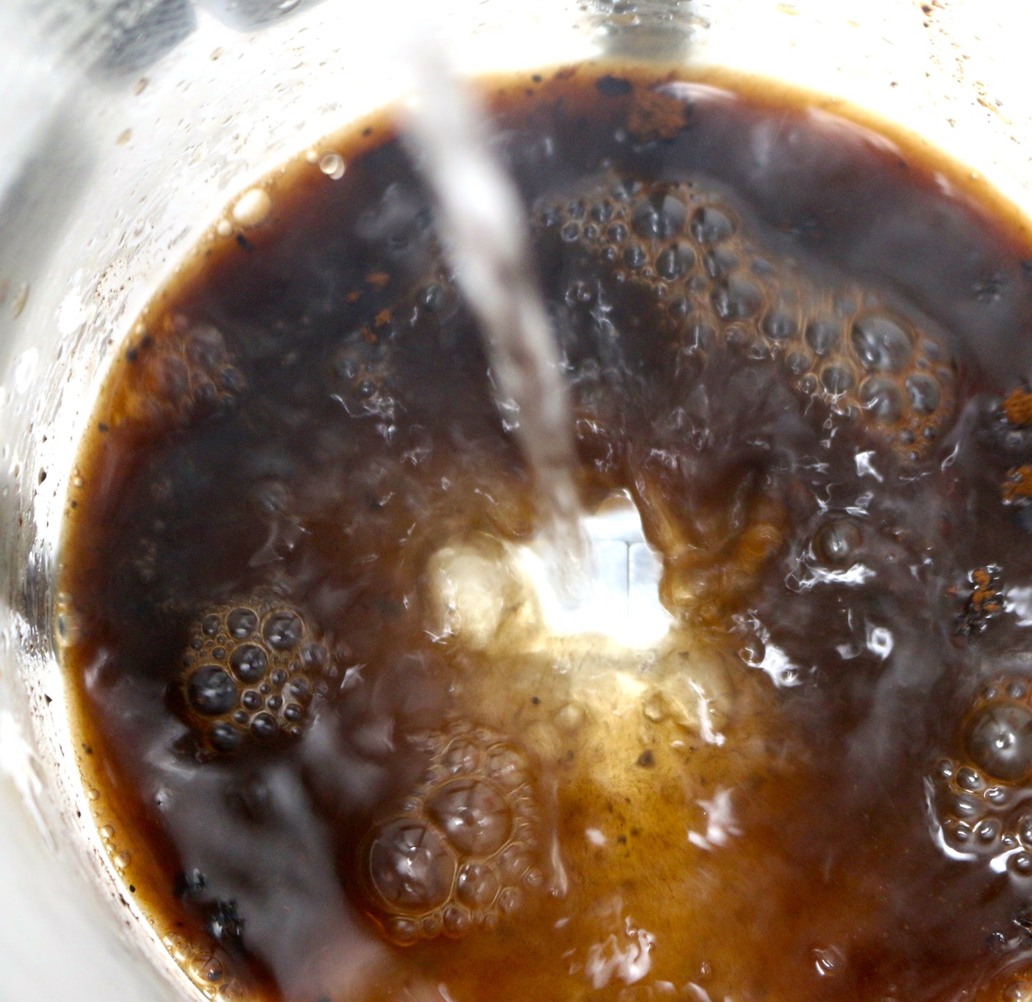 Brewing Cophīe with water in French Press