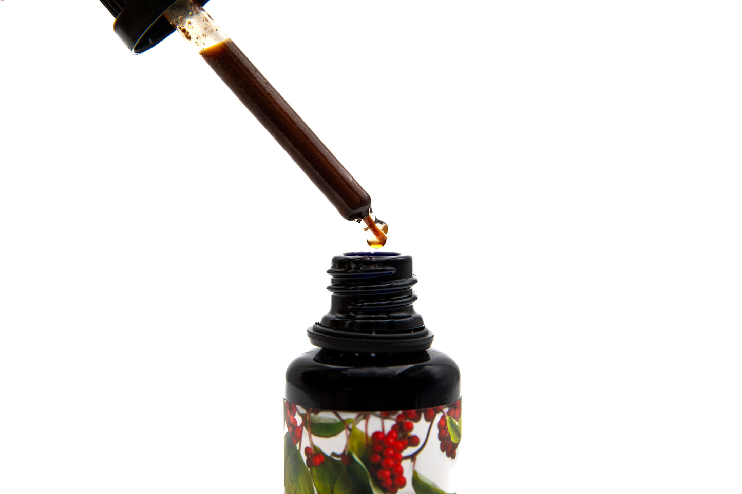 Pictured is a close up of a dropper full of Schizandra Pure Traditional Sake