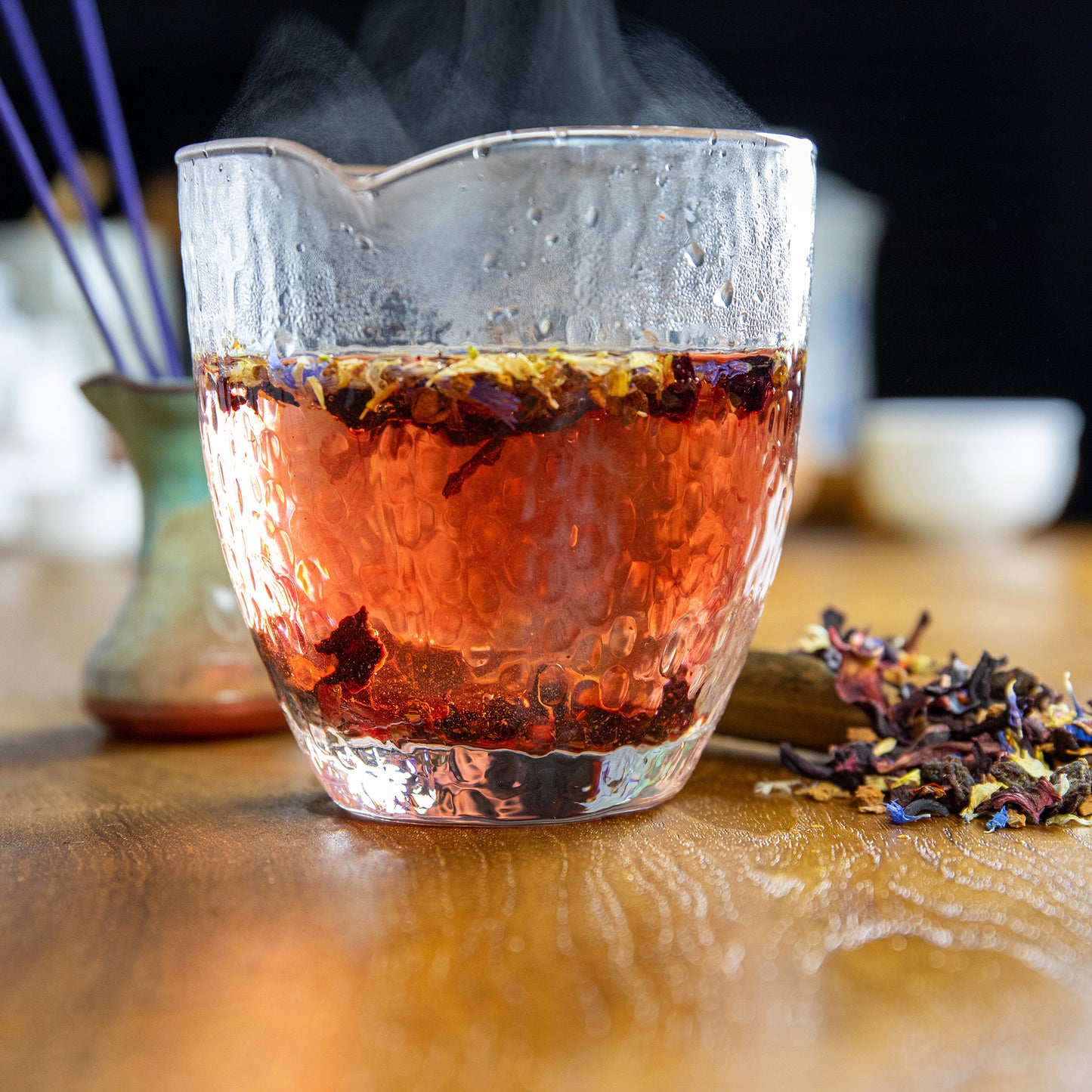 Pictured is a close up of a glass of Shen Blossom's Tea of Love that nourishes the mind and promotes a healthy cardiovascular system