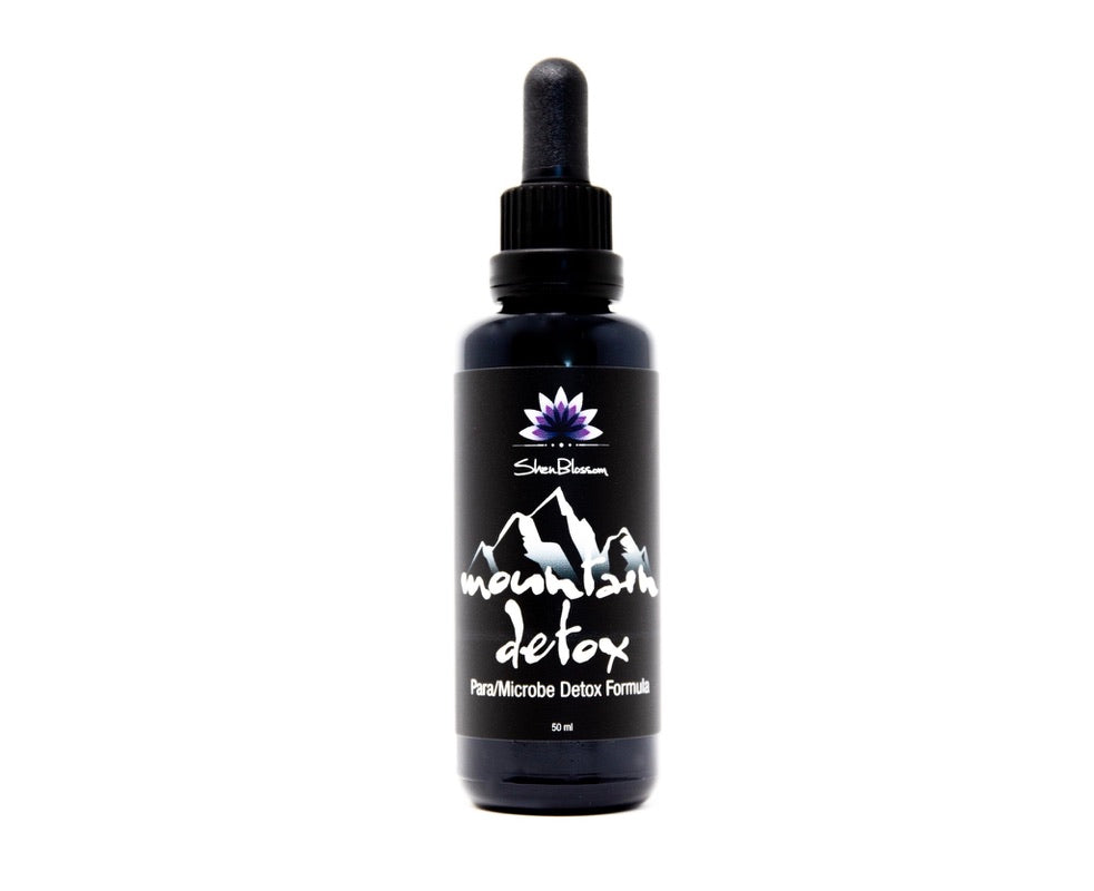 A Shen Blossom Mountain Detox bottle photographed on a white background