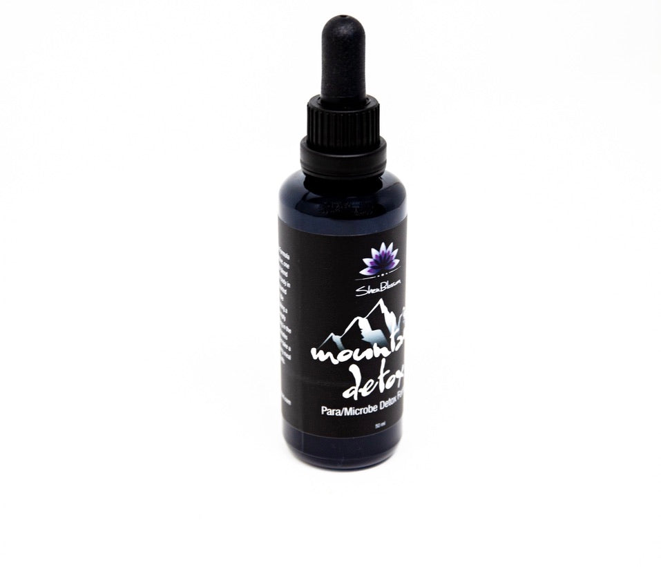 A Shen Blossom Mountain Detox bottle photographed on a white background