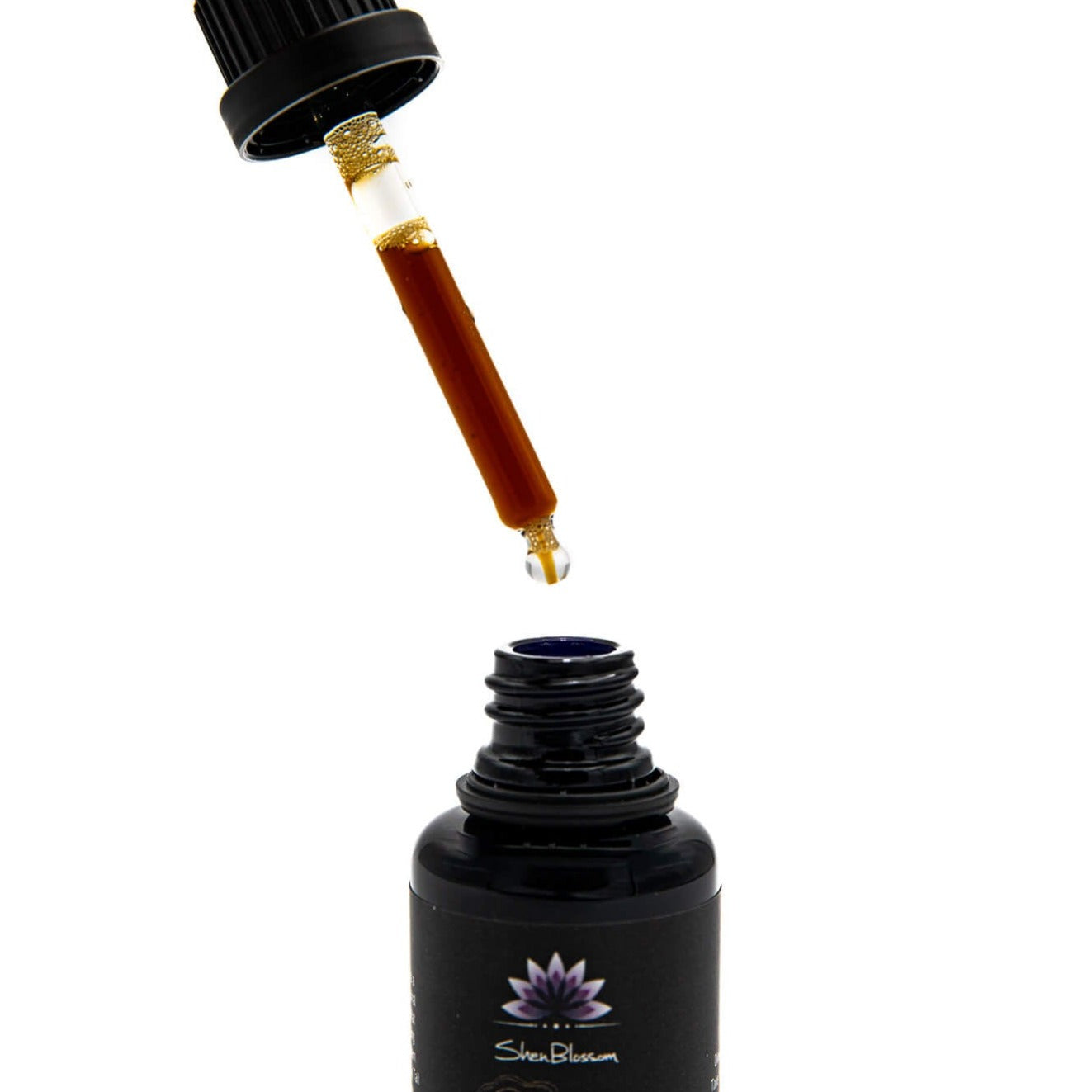 This is a picture of a dropper full of Turkey Tail Traditional Sake Extract