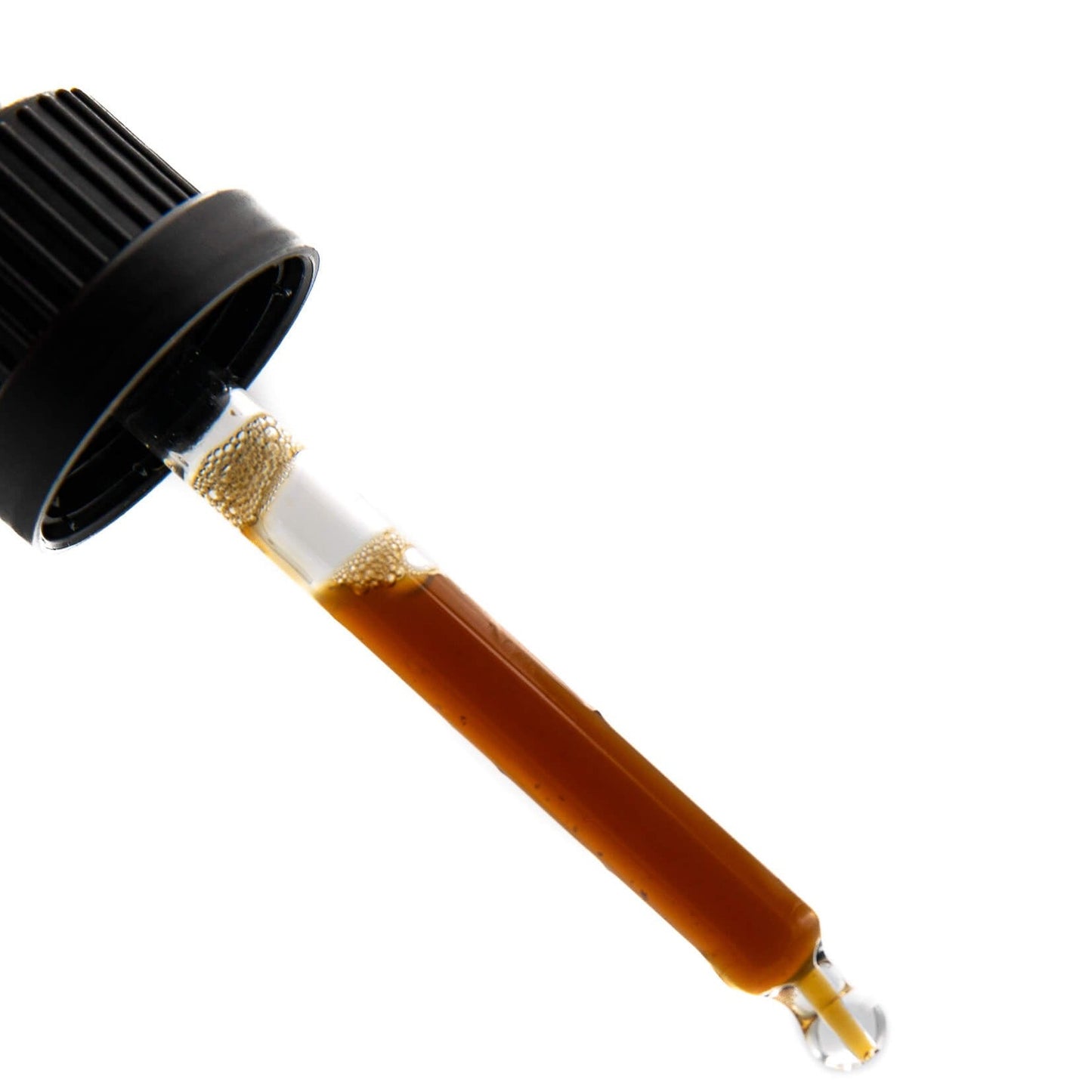 Pictured is a dropper full of Turkey Tail Traditional Sake Extract