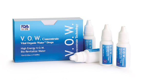 A box of V.O.W. Concentrate Vital Organic Water drops and 4 V.O.W.