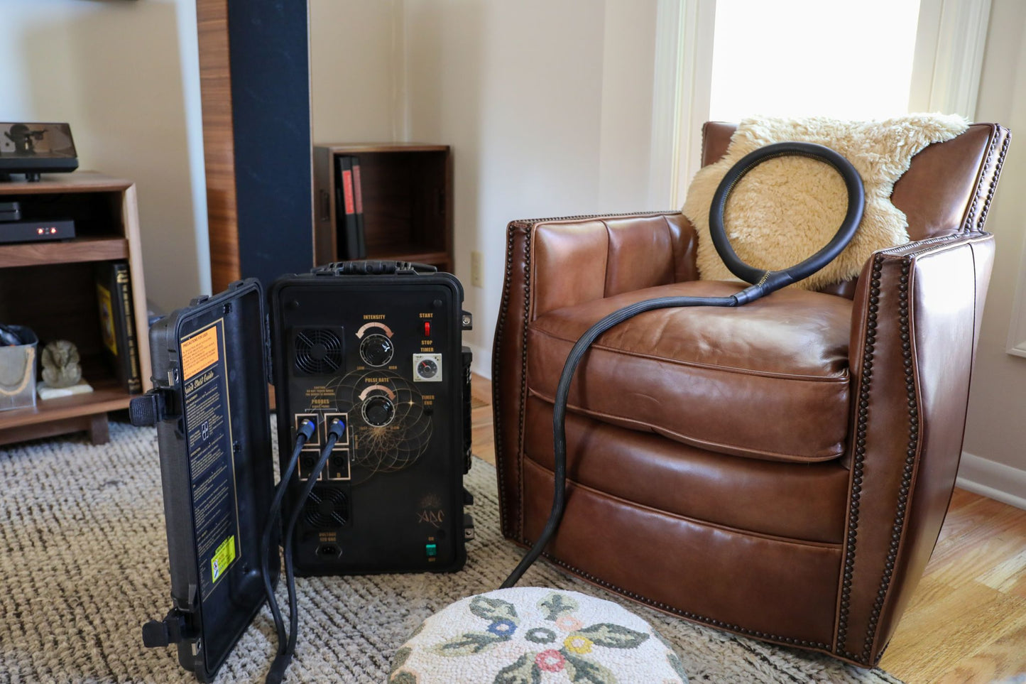 ARC PEMF setup for use next to a chair in a living room showing ease of setup