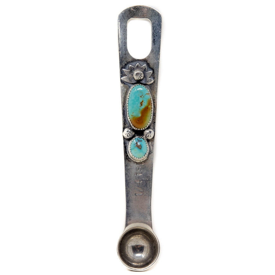 Pictured is Shen Blossom's silver 1/4 measuring teaspoon made individually by hand.