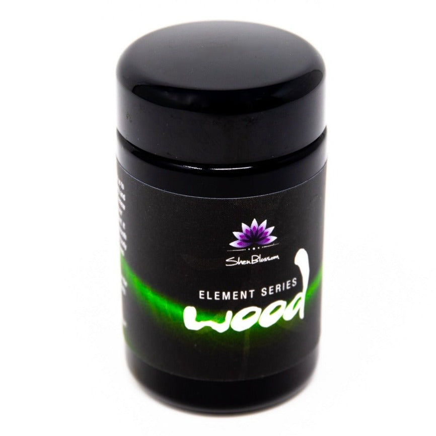 Pictured is a top view of a bottle of Shen Blossom's Wood from their Element Series
