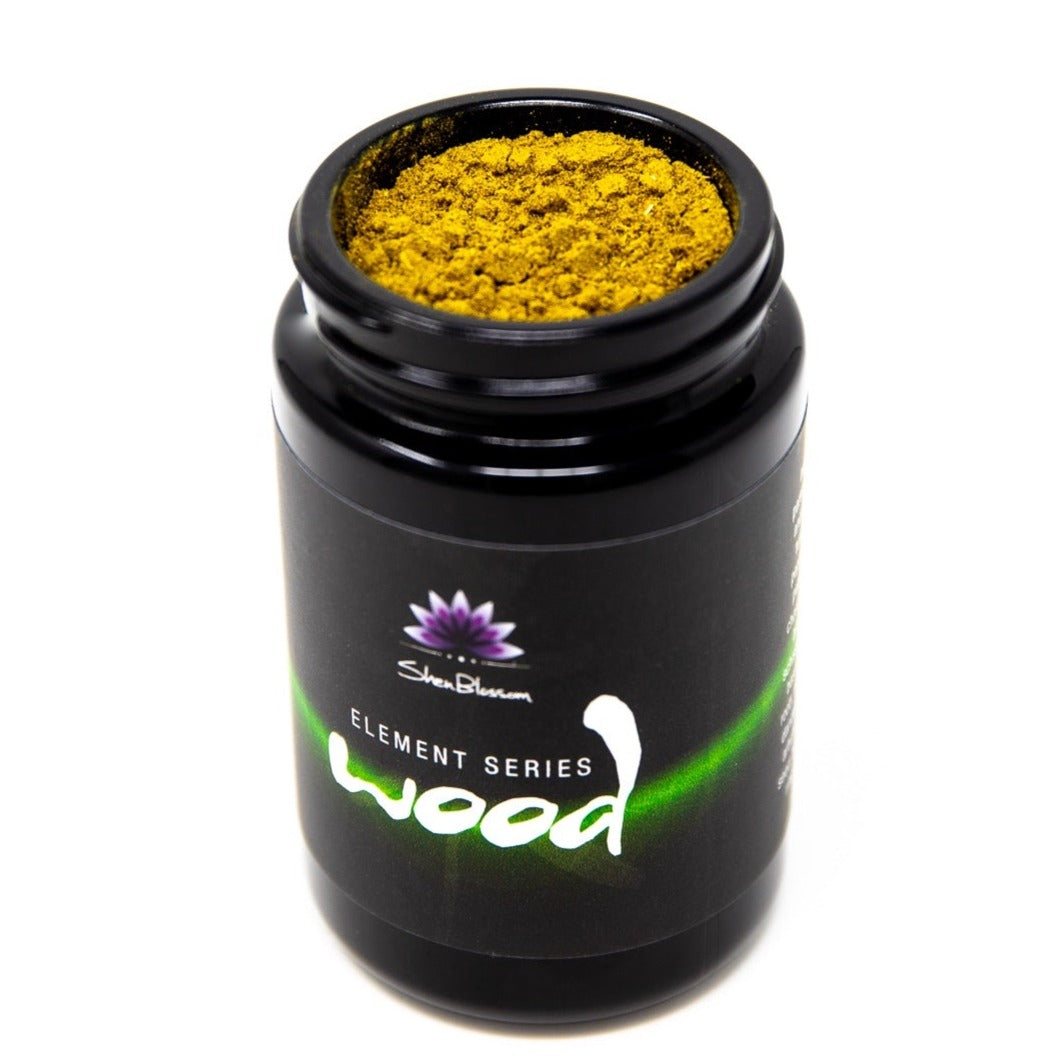 A bottle of Shen Blossom's Wood supplement from their Elements Series