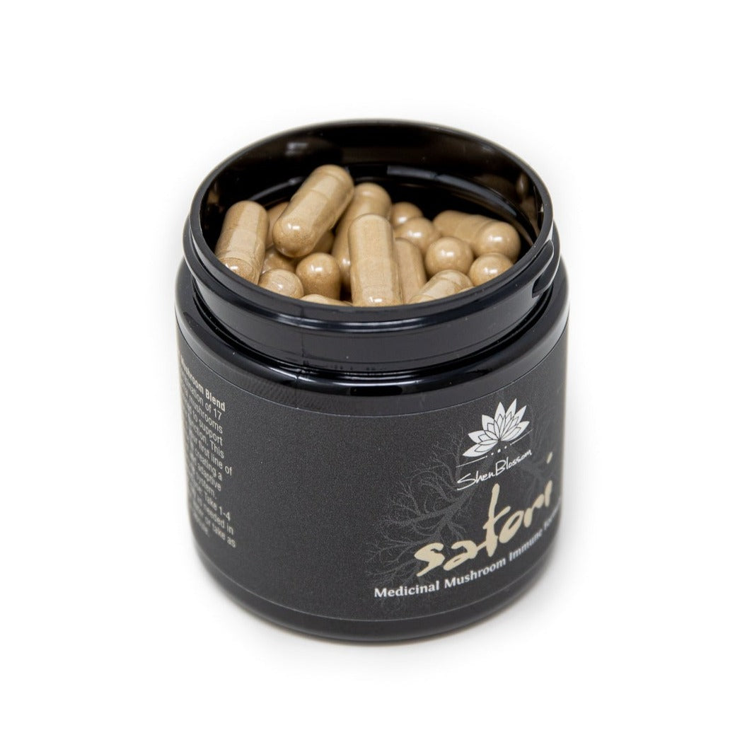 Pictured are the capsules contained inside Shen Blossom's Satori Mushroom formula