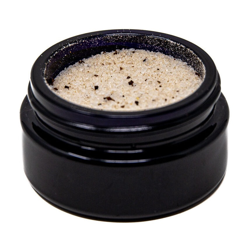 An up close picture of Shen Blossom's Tri-Mushroom Salt photographed on a white background