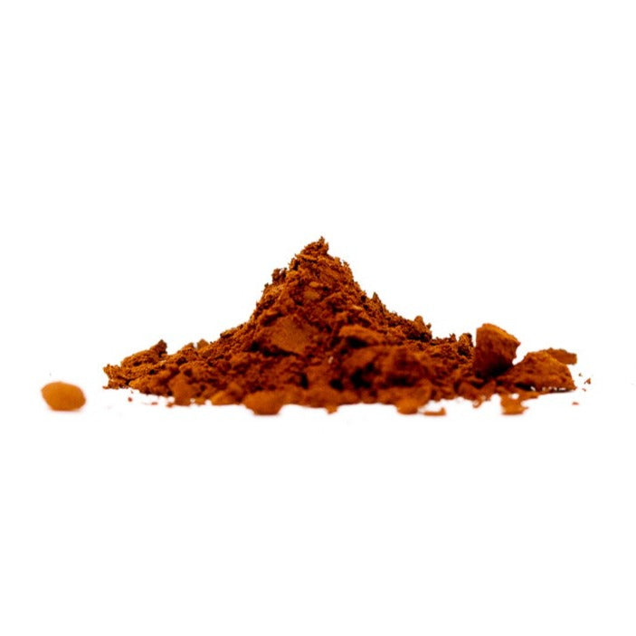 A pile of Shen Blossom's Wild Red Reishi Mushroom Full Spectrum Powder photographed on a white background