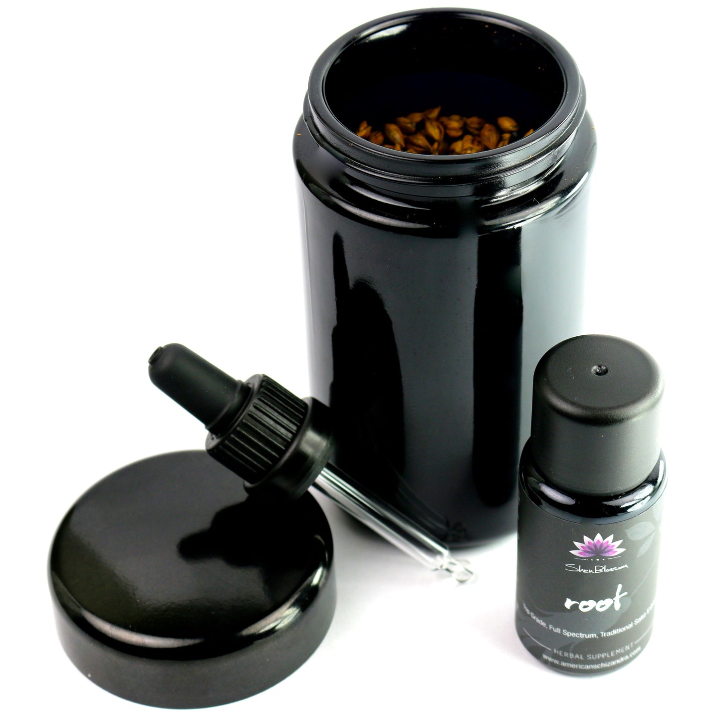 Shen Blossom's Root Ginseng extract and dropper photographed on a white background