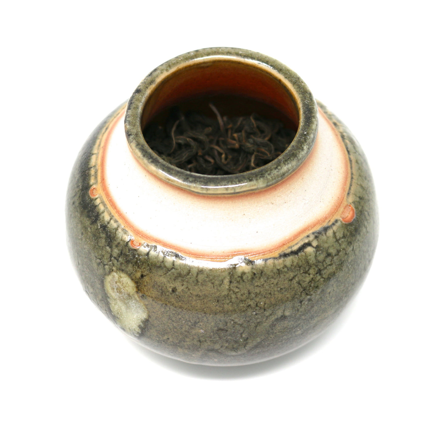 This is a bowl of Shen Blossom's Amacha Loose Leaf Tea photographed on a white background