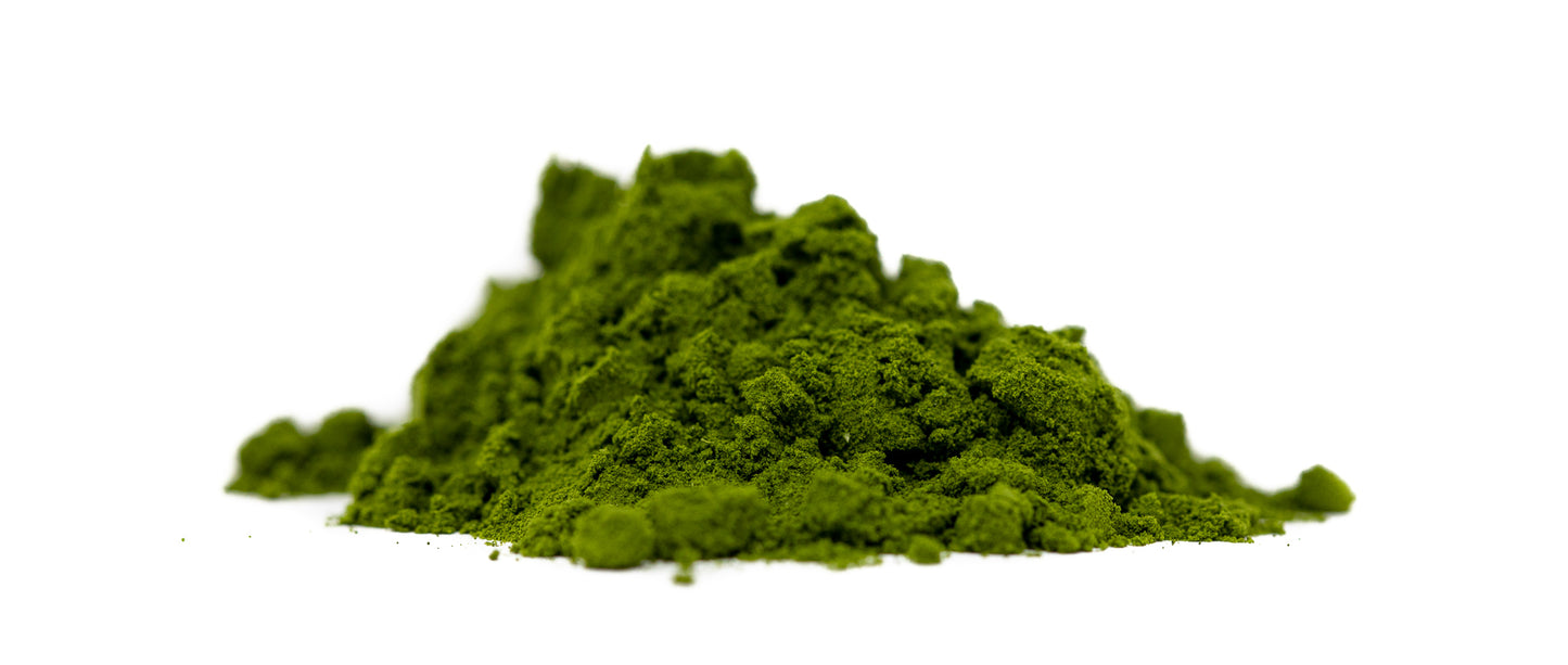 A pile of Shen Blossom's Bamboo Chlorophyll Powder photographed on a white background