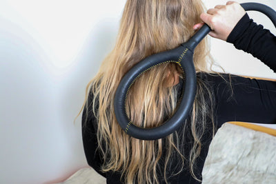 ARC PEMF Small Loop Applicator on a woman's back