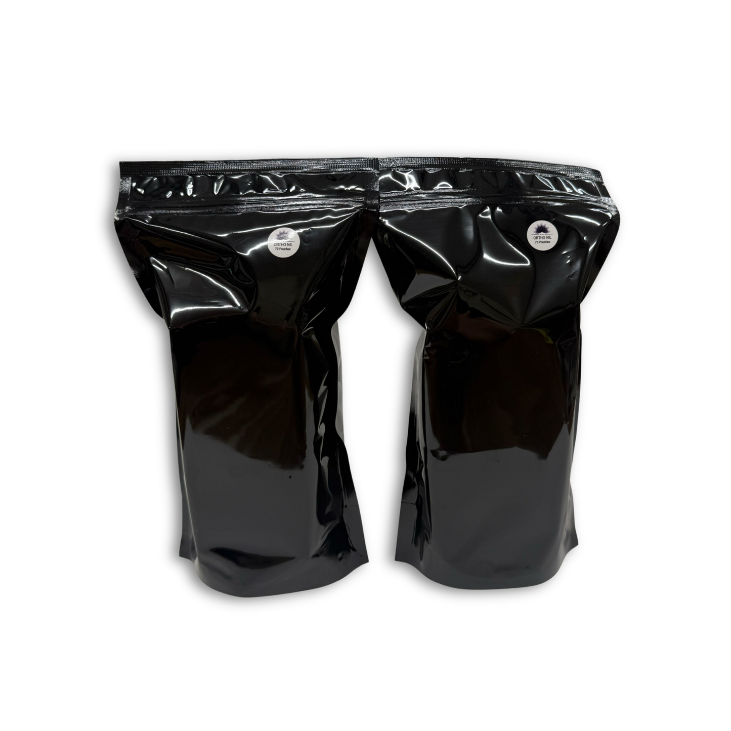 
                  
                    Two black bags of 70 Ortho Nil pain packets photographed on a white background
                  
                