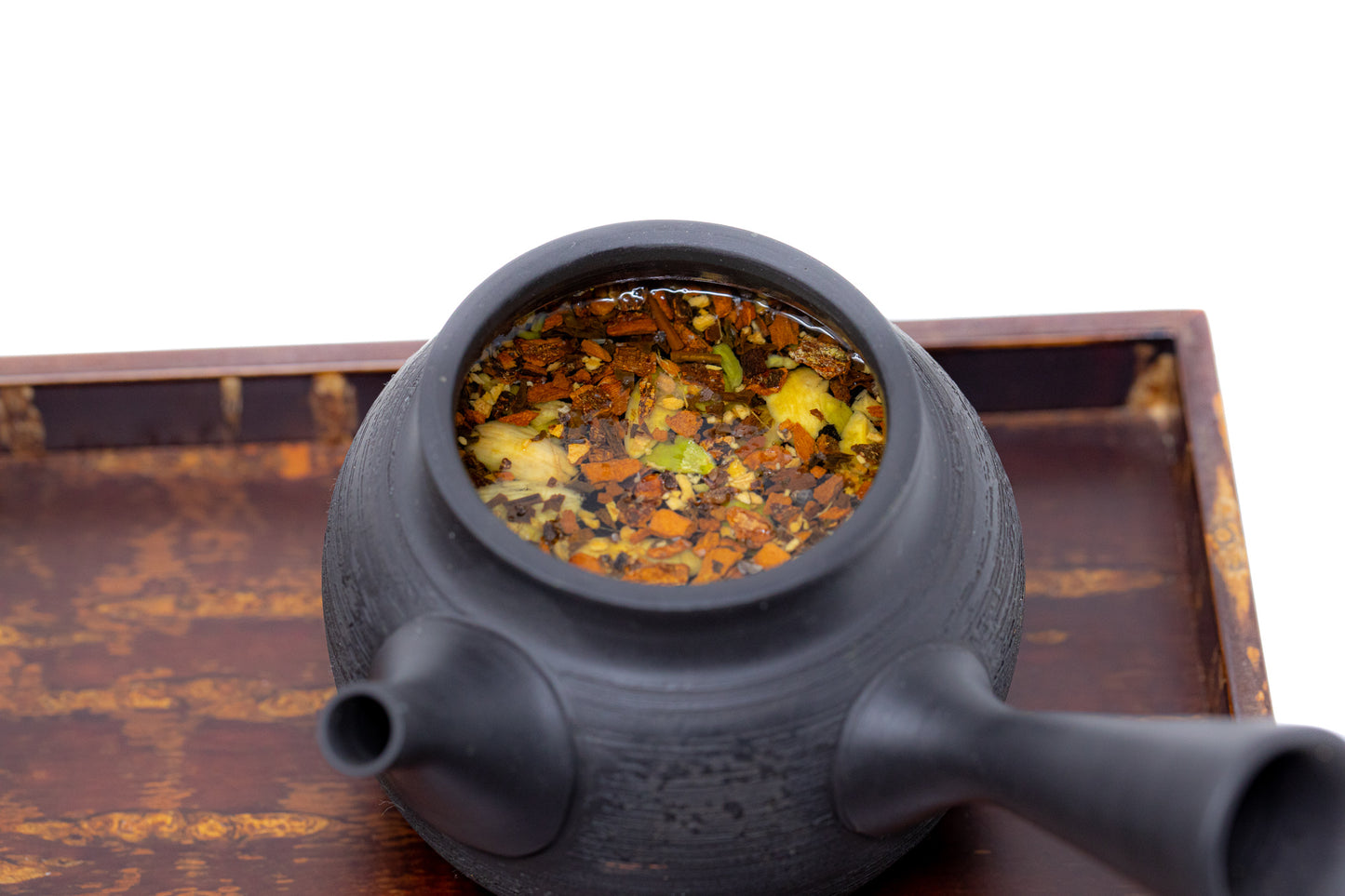 
                  
                    Teapot with brewed chai
                  
                